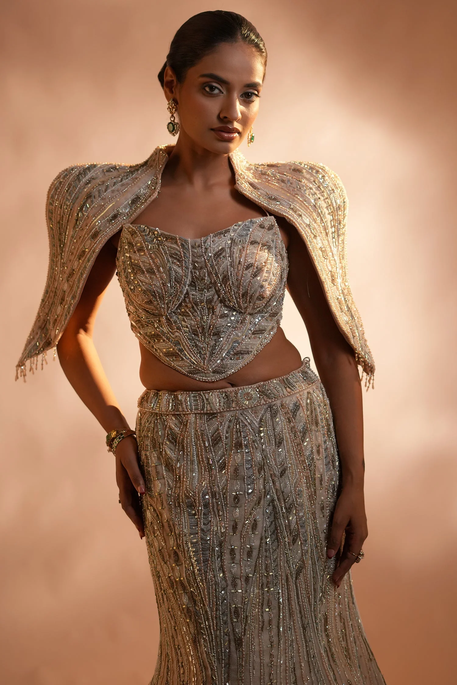 Blush Pink Net Mermaid Lehenga Set with Structured Corset Blouse and Embellished Shoulder Cape - Image 4