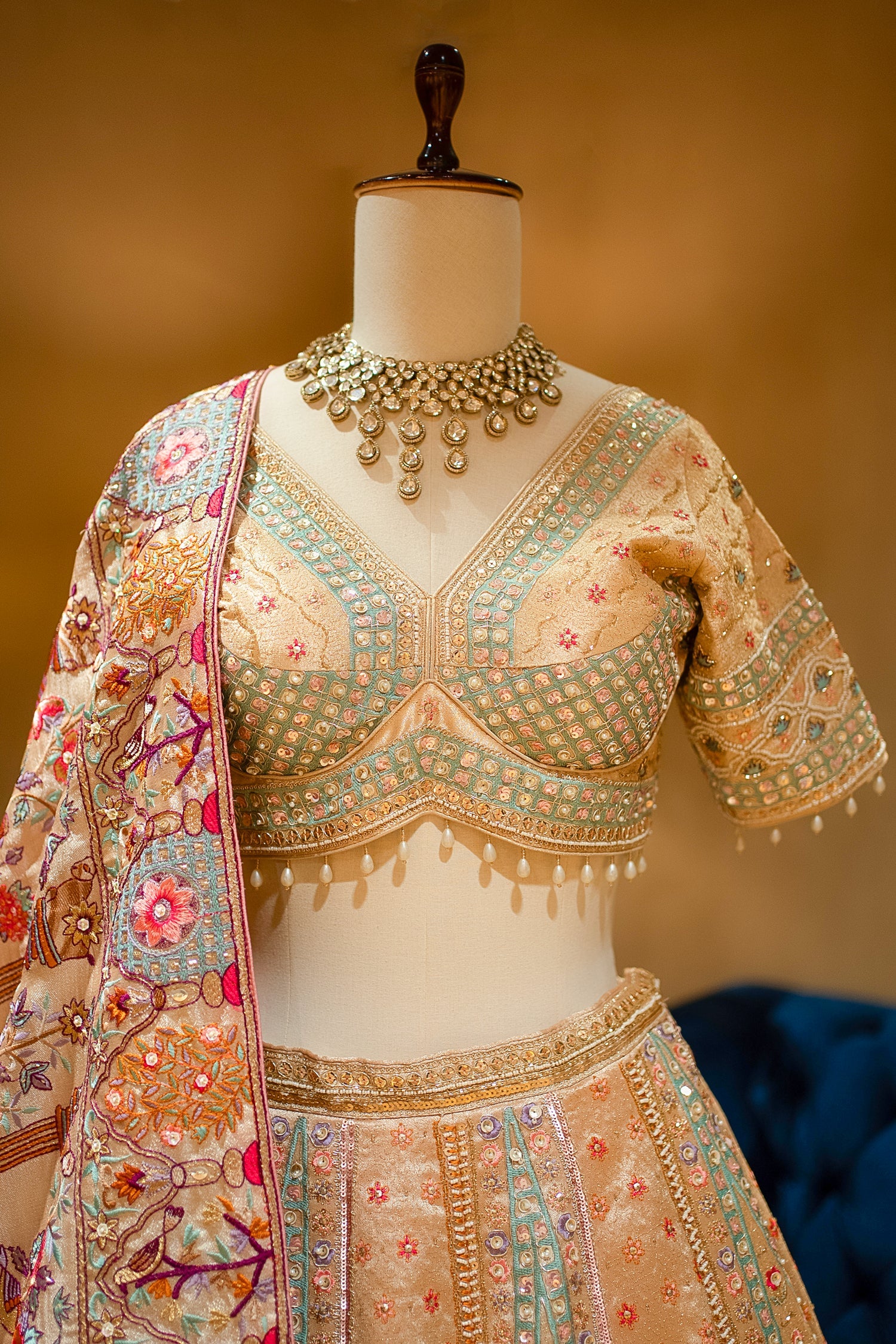 Gilded Floral Tissue Silk Lehenga with Multi-Hue Hand-Embroidery and Architectural Cutdana - Image 4