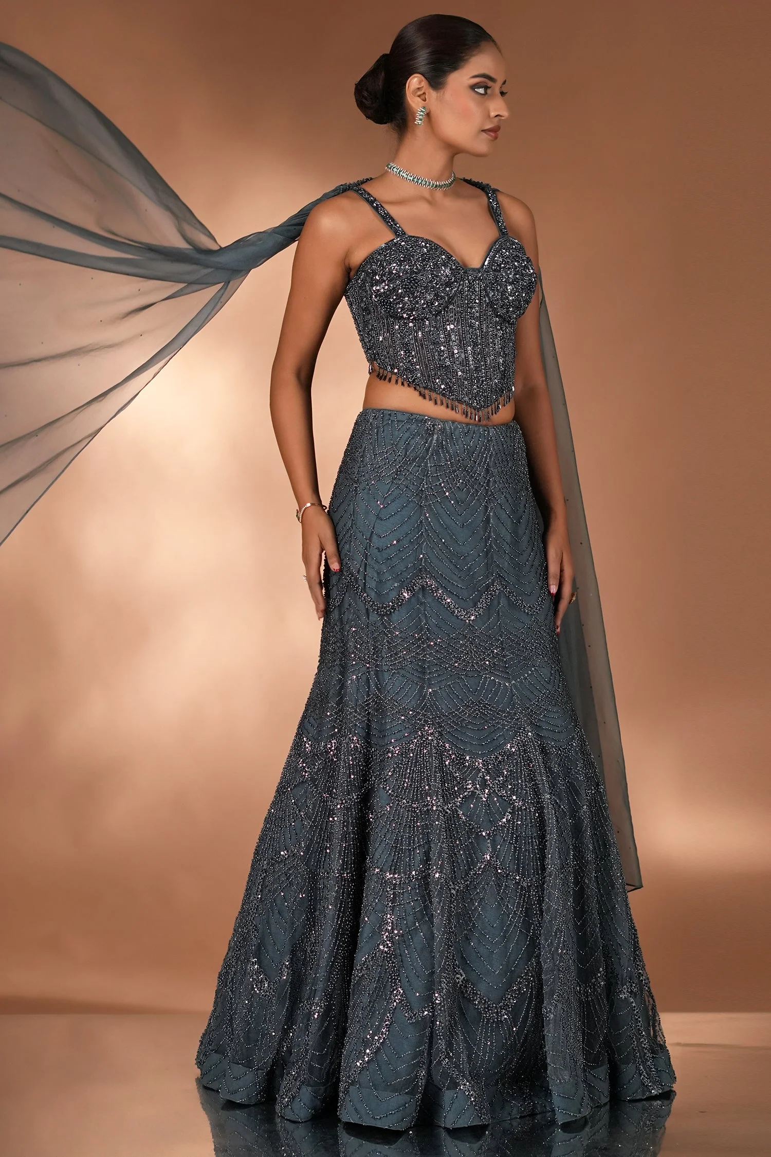 Prussian Blue Net Cutdana Beaded Mermaid Style Lehenga with Embellished Corset Blouse - Image 2