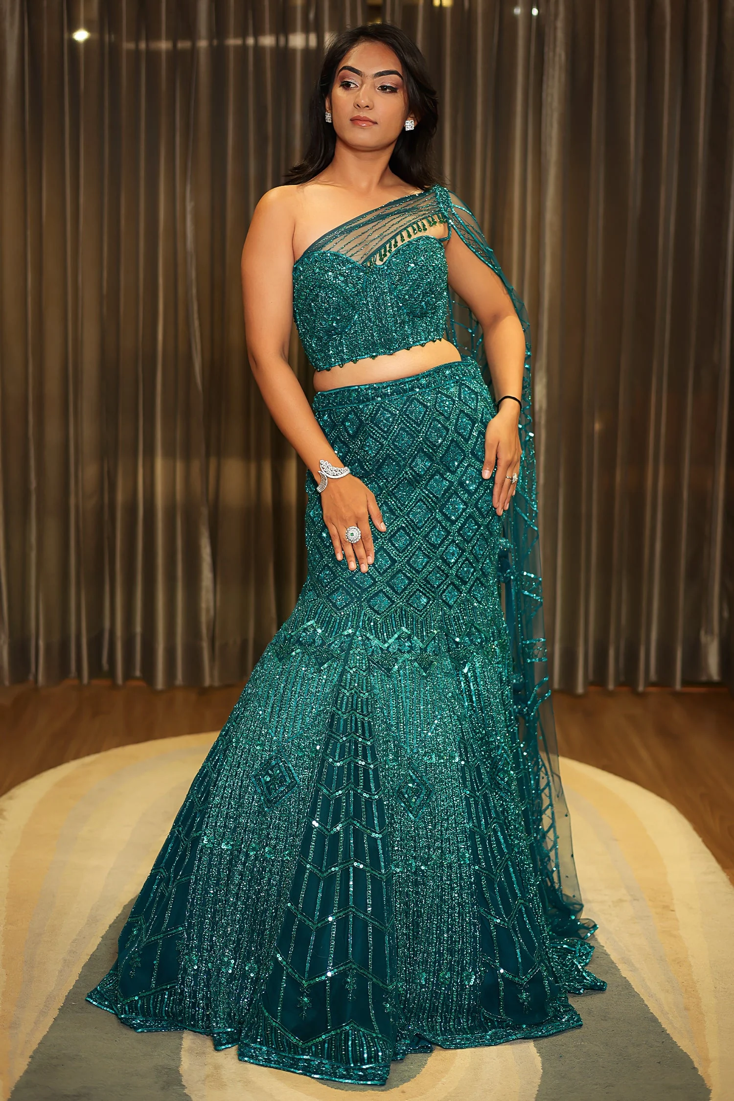 Teal Blue Net Embellishment Fish Cut Sequin Cutdana Work Lehenga with One Shoulder Cape Corset - Image 3